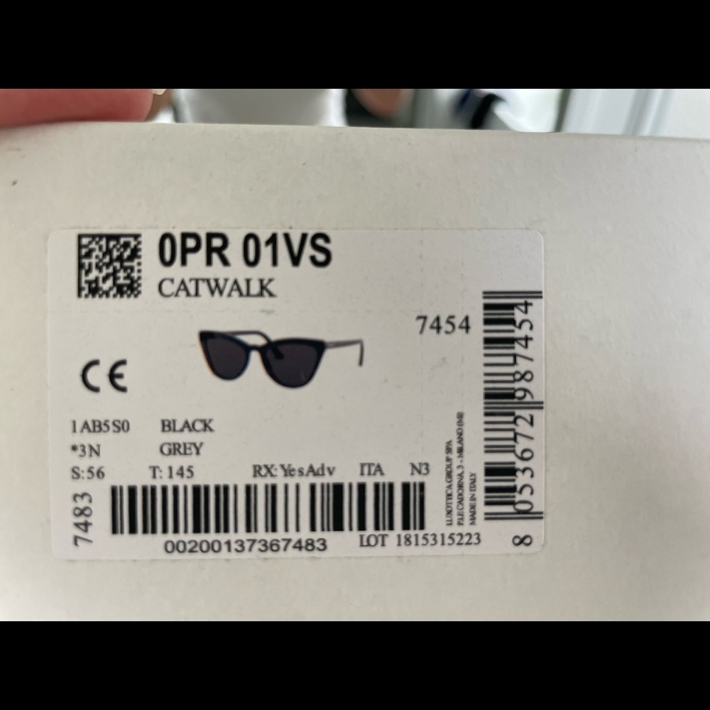 Prada Catwalk Sunglasses in Black.